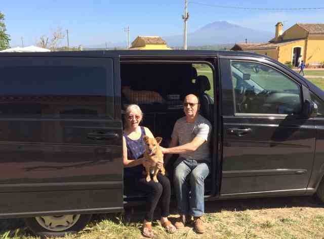 Jan and Ian (& Julio, plus their 4 cats in the car) at a lovely rural hotel in Sicily, on their way from Manilva in S.Spain to Malta, with Mt Etna in the background.